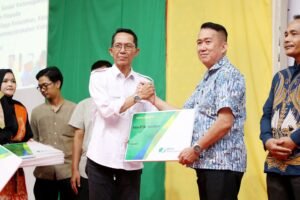 Amsakar Resmi Luncurkan Program Jaminan Sosial Ketenagakerjaan Bagi RT, RW, LPM, dan Pekerja Rentan
