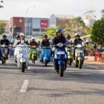 Amsakar Achmad dan Li Claudia Bangun Kebersamaan Lewat Salam Satu Aspal