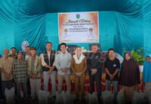 Kunjungan Kerja di Bunguran Barat, Bupati Natuna Serahkan Bantuan Beras Cadangan Pemerintah Daerah